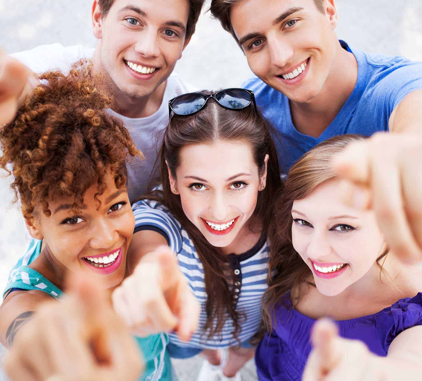 Young people pointing at you.